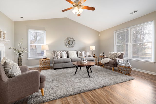 Furnished living room with a grey rug